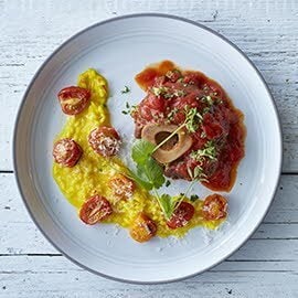 Bắp Bê Osso Busso Ăn Kèm với Cơm Risotto Bắp Bê Osso Busso Ăn Kèm với Cơm Risotto