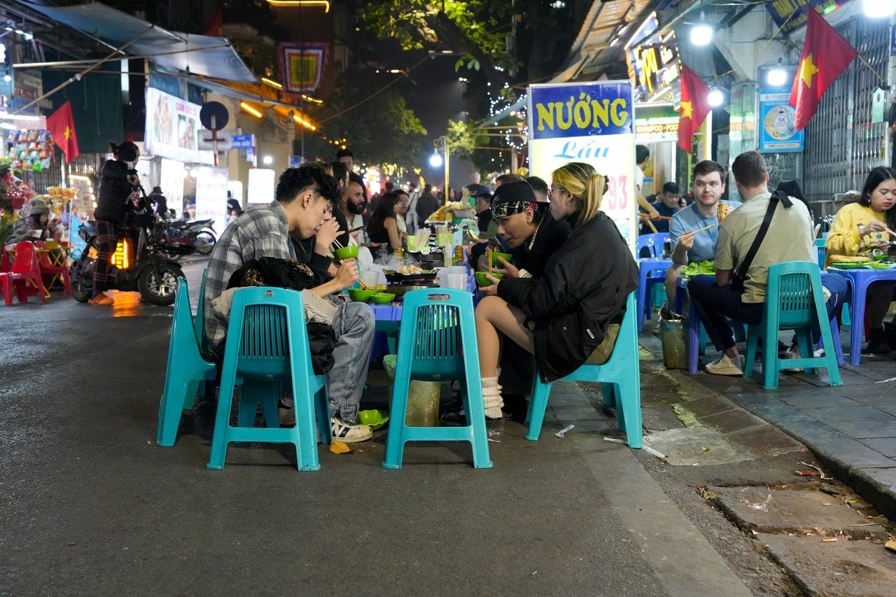 The social life including bars, shops and restaurants of the Vietnamese in the Old Quarter takes place outdoors on the narrow pavements of Hanoi in Vietnam Asia
01/22/2025