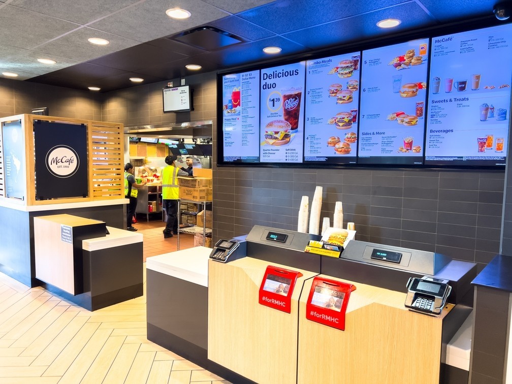 Broomfield, Colorado, USA-October 20, 2024-Interior of a McDonald restaurant with digital menu boards, self-service kiosks, and seating area. Clean and modern setup enhances convenience and customer