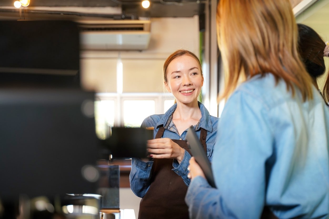 Group young woman people leaning and education workshop for classes barista coffee in cafe room.  Preparing teacher meeting and training service about hospitality and make coffee.  Education Concept