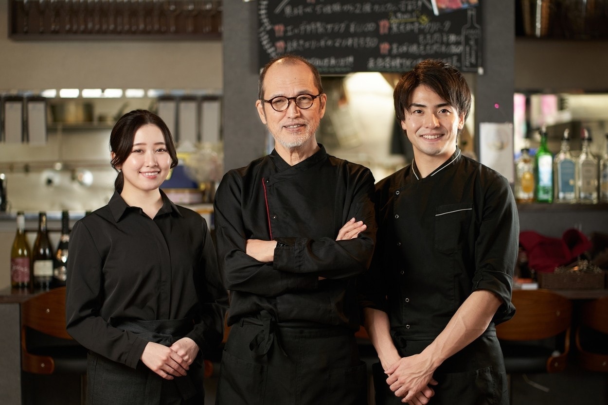 Asian men and women working in restaurants